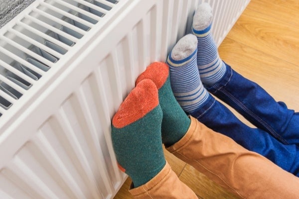 socked feet on radiator