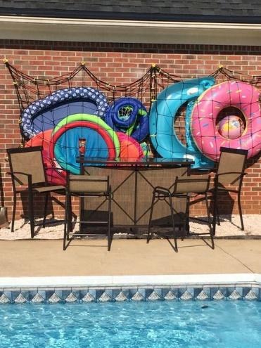 pool floats in a cargo net