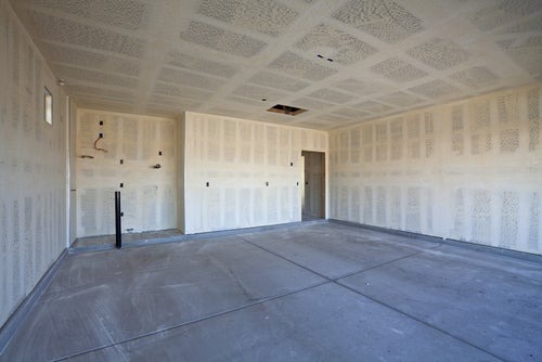 garage walls with unpainted drywall