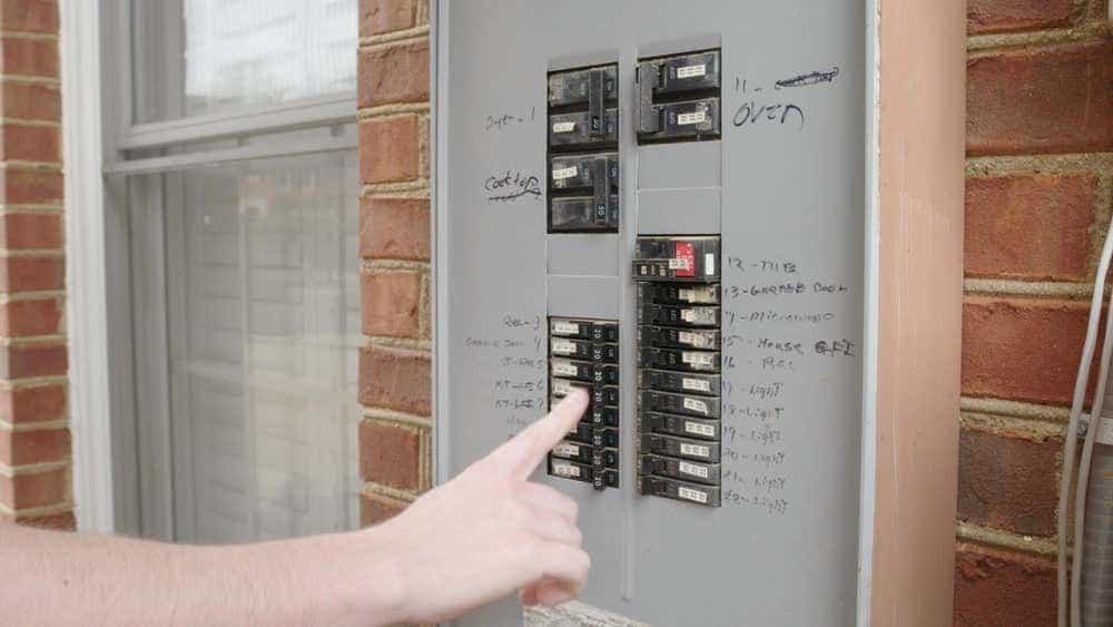 inspecting a breaker box