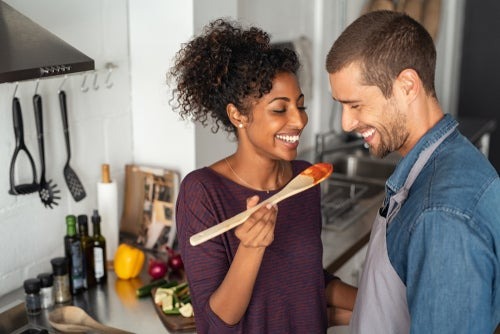 couple tasting food