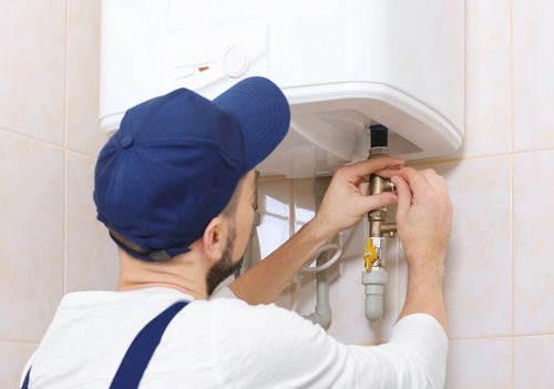 performing maintenance on water heater