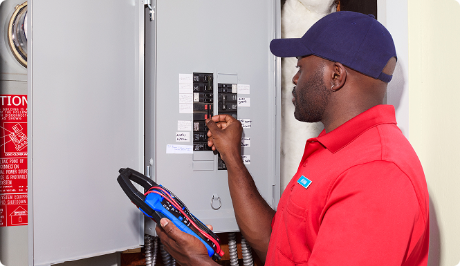 Expert testing breaker box.